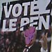 A row of political posters de-faced before the French election. Paris.